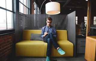 Business owner making notes in a cafe