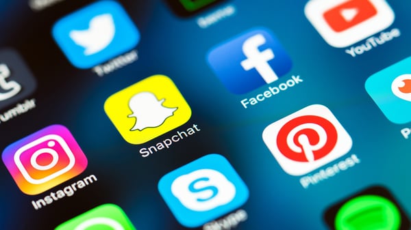 Social Media apps on a phone including snapchat and Facebook